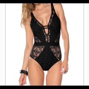 Becca one piece bathing suit. Size small.